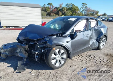 2023 Tesla Model Y Awd/Long Range Dual Motor All-Wheel Drive z USA, uszkodzony, nr VIN 7SAYGDEE4PA161053